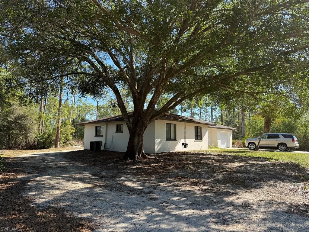 Photo of 1503 E 14th ST, LEHIGH ACRES, FL 33972 (MLS # 226013309)