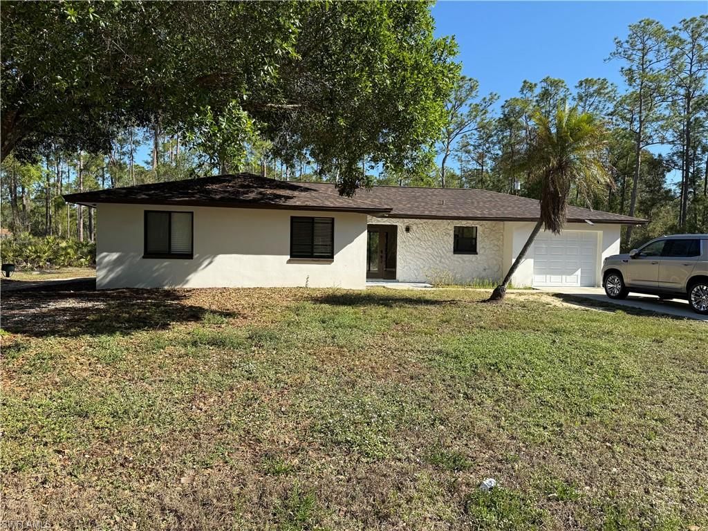 Photo of 1503 E 14th ST, LEHIGH ACRES, FL 33972 (MLS # 226013309)