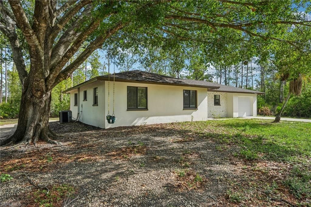 Photo of 1503 E 14th ST, LEHIGH ACRES, FL 33972 (MLS # 226013309)