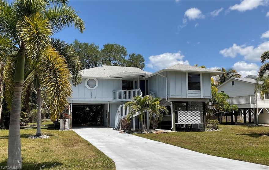 Perfect opportunity to buy a home in Captains Cove in Bokeelia. Community Gulf Access Boat ramp make this such a great value with some of the best fishing on the west coast.  2 bedroom 2 bath fully furnished home is move in ready. The roomy screened porch is accessed by glass sliders that open to the great room and dining room area. Homes for sale in Captains cove do not last long so make an appt today!