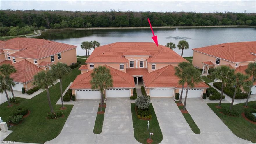 Paradise amongst the palm trees!  Living is easy in this bright and spacious well-maintained 2nd floor end-unit 2 bedrooms PLUS den, 2 baths and a 2-car garage. The view of large lake with water feature from lanai, kitchen and family room and master bedroom are spectacular!  Enjoy your favorite beverage and relax on the lanai enjoying this lovely view watching the beautiful Florida sunsets!  The floor plan is open and flowing and boasts vaulted ceilings giving this condo a spacious feel along with privacy for guests and for the master suite. Large master suite with walk-in closets and master bath with walk-in shower and dual sinks.  The light and bright kitchen features maple cabinets, breakfast bar and eat-in area overlooking the lake, newer appliances. 
The den/study flows into the main living space.  Convenient laundry room.  Hurricane protection for peace of mind.  Take a stroll or ride your bike to the community pool, clubhouse, tennis courts, basketball, shuffleboard, fishing pier.  Enjoy the close proximity to I-75, shopping, restaurants, spring training facilities for Boston Red Sox and Minnesota Twins and so much more. 1-year home warranty for the buyer is included!