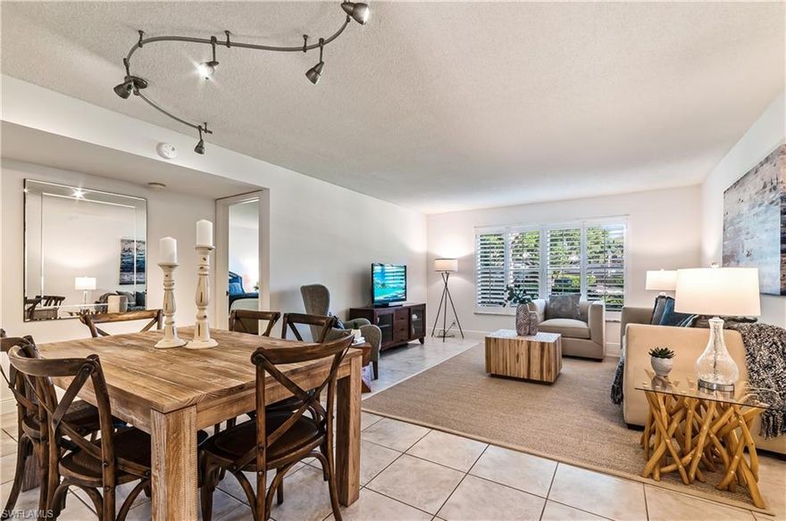 Many updates in this open feeling 2 bedroom, 2 full bath condo!  Tile flooring throughout, updated kitchen with white cabinetry and granite countertops, new HVAC December of 2019, impact doors and windows throughout, updated baths.  Beautiful view to Broad Avenue South.  Only 5 blocks to the beaches and 2 blocks to shopping and restaurants on Third Street!  Awesome location!!