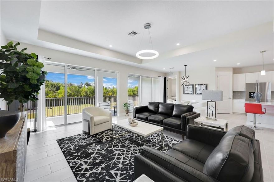 NEW CONSTRUCTION - MOVE IN NOW! Gorgeous Sunsets and Chic Modern Finishes are just two of the highlights of this 2nd Floor Grand Coach Home at Antilles in Naples. Featuring a large open floor plan with 2,444 sq ft under air, Modern High End Finishes throughout, Beautiful Stainless Steel KitchenAid Appliances available for the Kitchen, Impact Glass Throughout, Frameless Glass Shower Enclosures throughout, 12" x 24" Porcelain Tile throughout, 3 bedrooms / 2 baths, loft, 2 car garage, CBS Construction, Cement tile and Metal Roof. LOW FEES of only $535 per month, including the Master Association Fee. FANTASTIC Location - Minutes to Marco Island OR to Downtown/Old Naples. Beautiful Amenities include: Walking Paths throughout the community, Large Resort Style Pool with plenty of sun and shade decks, outdoor Tiki bar area, Fire Pit, 5,000 sq. ft. clubhouse featuring a Fitness Room, large gathering room, catering kitchen and bar area, 4 Pickle Ball Courts, 2 Bocce Courts, and Putting Green...Come and See Antilles today! PHOTOS ARE OF A FURNISHED UNIT THIS UNIT BEING OFFERED UNFURNISHED.