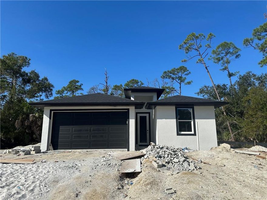 Brand-new pre-construction home in Port Charlotte featuring 3 bedrooms, 2 baths, and 1,186 sqft of thoughtfully designed living space. This modern build offers a sleek, contemporary kitchen with upgraded finishes, an open layout, and a custom fireplace and TV feature wall that elevates the main living area. The split floor plan provides privacy, spacious bedrooms, and quality craftsmanship throughout. Located in a rapidly growing area surrounded by new construction, this property is ideal for primary living or investment. Sellers are offering concessions toward closing costs or rate buy-down. Secure this home now while there is still time to select certain finishes.