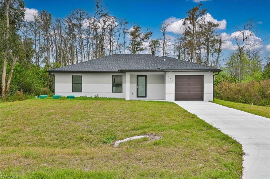 Welcome to this spacious 3-bedroom, 2-bathroom home featuring high-quality, professional finishes throughout. Situated on a beautiful quarter-acre lot, this property exhibits the perfect balance of privacy and convenience—close to town yet peacefully secluded. The home provides easy access to State Road 82, making commutes to Immokalee and Fort Myers quick and convenient. Located in an up-and-coming area with exciting plans for future development, this property is an excellent opportunity for both homeowners and investors. Inside, you’ll find tile flooring throughout, stainless steel appliances including a washer and dryer, granite countertops, and ceiling fans in every room. The garage features durable epoxy flooring, while hurricane impact windows and doors provide added safety and peace of mind. The primary bedroom includes a spacious walk-in closet, offering comfort and functionality. This budget-friendly home has great potential in starting a family or expanding your real estate portfolio—don’t miss the chance to own in an area poised for growth.