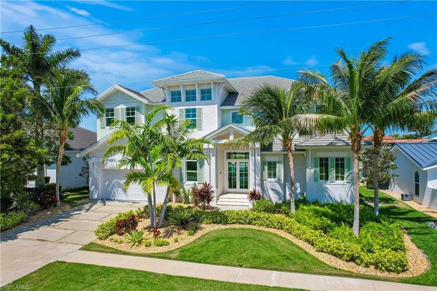 Coastal living at it's best within walking distance to Tiger Tail beach! This professionally decorated turnkey home offers 7 bedrooms (2 Owner Suites) & 6.5 baths, office, media room and an open air lanai to enjoy the outdoors in paradise.