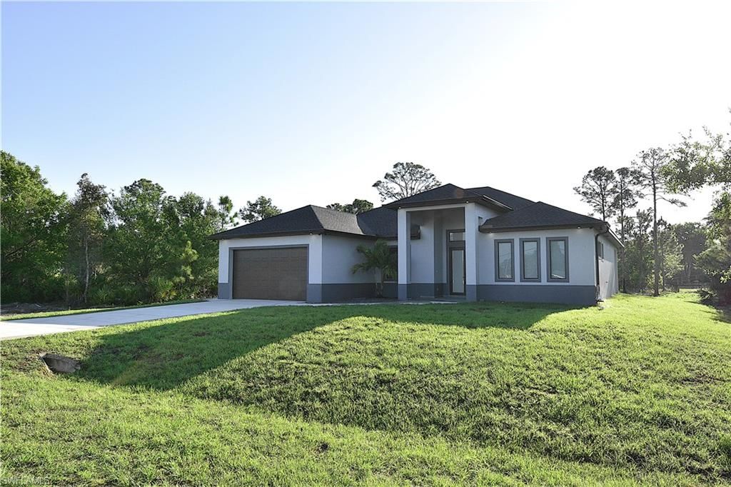 Photo of 920 Edward AVE, LEHIGH ACRES, FL 33936 (MLS # 226014209)