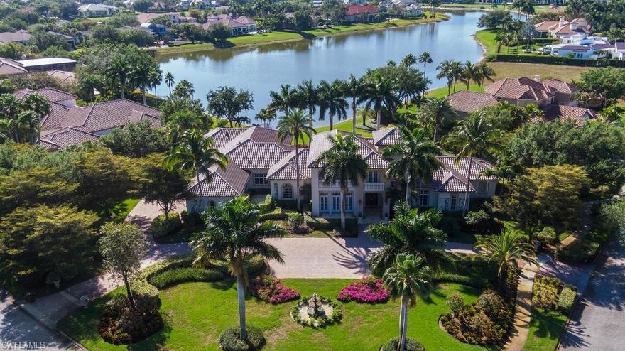 H.15809 - Grand elegance comes to mind upon entering this estate situated on over 1.3 acres with lush grounds, fountains and water views reminiscent of an exclusive resort. This home exudes quality and good taste throughout with the large gourmet kitchen boasting an approx 7'6 x 10’9 granite island, classic cabinetry, Wolf and Sub Zero appliances, warming drawer, 2 dishwashers (1 new ASKO), adjacent butler’s pantry and wet bar plus a wine cellar with 2500 bottle capacity. With loads of formal and informal spaces, the well designed floor plan offers a formal dining room with adjacent courtyard, stately study, a spacious master suite with his/hers bathrooms, huge closets, an exercise room and stunning views. Three of the 5 bedrooms are located on the first floor with an additional master suite and guest suite upstairs with front/rear balconies. The vast lanai offers water views as far as the eye can see as well as a remarkable outdoor kitchen, lap pool /spa with covered and uncovered verandas, water features, fire pits and much more. Retractable screens and shutters, a new roof in 2019, new sliders in 2020 and myriad updates and upgrades make this Quail West home better than new.