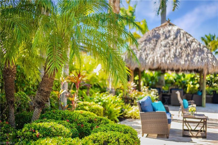 Lot 134 - Tropical Oasis Motorcoach Property in Naples Motorcoach Resort

Welcome to your own private oasis within the gates of the highly sought-after Naples Motorcoach Resort. From the moment you arrive, you are greeted by a grand, flower-filled entrance framed by stately Royal Palms, leading to a striking fountain and elegant clubhouse. Meandering down the palm-lined roads, you arrive at this beautifully landscaped, fully paved motorcoach property that offers exceptional privacy and a true resort-style atmosphere.

This turn-key lot is thoughtfully designed for outdoor living and relaxation. Lush tropical plants and formal landscaping surround the property, creating a serene and secluded setting. The oversized tiki is ideal for entertaining or unwinding with your favorite beverage. Enjoy alfresco dining at your outdoor fire table perfect for enjoying the quiet evenings in paradise.

Beyond your property, Naples Motorcoach Resort offers an unmatched lifestyle. Launch a kayak from the community boat ramp and explore the natural beauty of Rookery Bay, or take advantage of the convenience of boating directly from the resort to nearby beaches or waterfront dining. Resort amenities include a stunning infinity pool, hot spa, fitness center, men’s and ladies’ saunas, pickleball courts, and a clubhouse with a catering kitchen available for owner use. Two additional satellite pools, each with hot spas, restrooms, and laundry facilities, add to the convenience. Even your four-legged companion is catered to with a dedicated dog park.

Naples Motorcoach Resort is a Class A–only community offering deeded, mortgage-eligible lots—ideal for personal enjoyment or investment. Investors will appreciate the on-site, management-run rental program, making this property well-suited for income generation or a 1031 exchange. The program handles advertising, bookings, payment collection, and applicable taxes, providing a truly hands-off ownership experience.

Experience the privacy, tropical beauty, and resort lifestyle that define Naples Motorcoach Resort—your opportunity to own a turn-key slice of paradise in Southwest Florida.