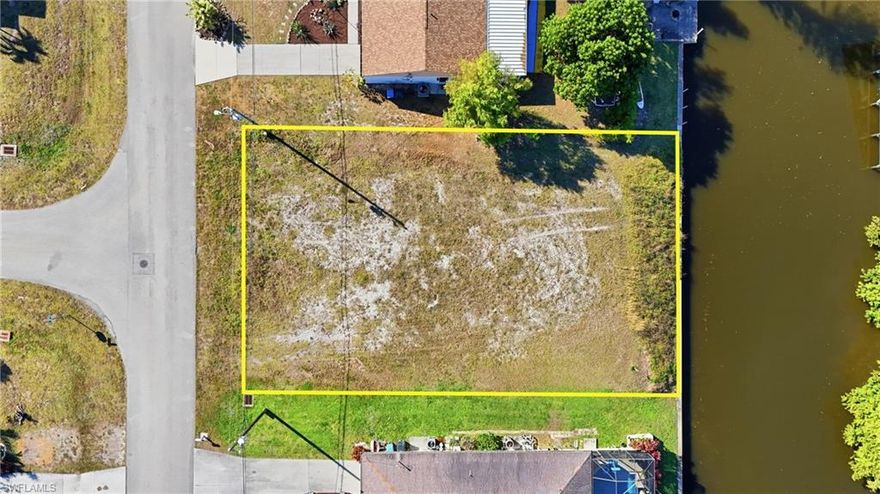 Wonderful opportunity to purchase a SW Cape Coral Gulf Access Lot with a Seawall already installed!  This canal system is one of the most desired in Cape Coral due to its proximity to the River and a Bridge that is the highest in Cape Coral.  The assessments are in and 100% paid!  One of the cheapest Gulf Access lots with Seawalls in Southern part of Cape Coral.