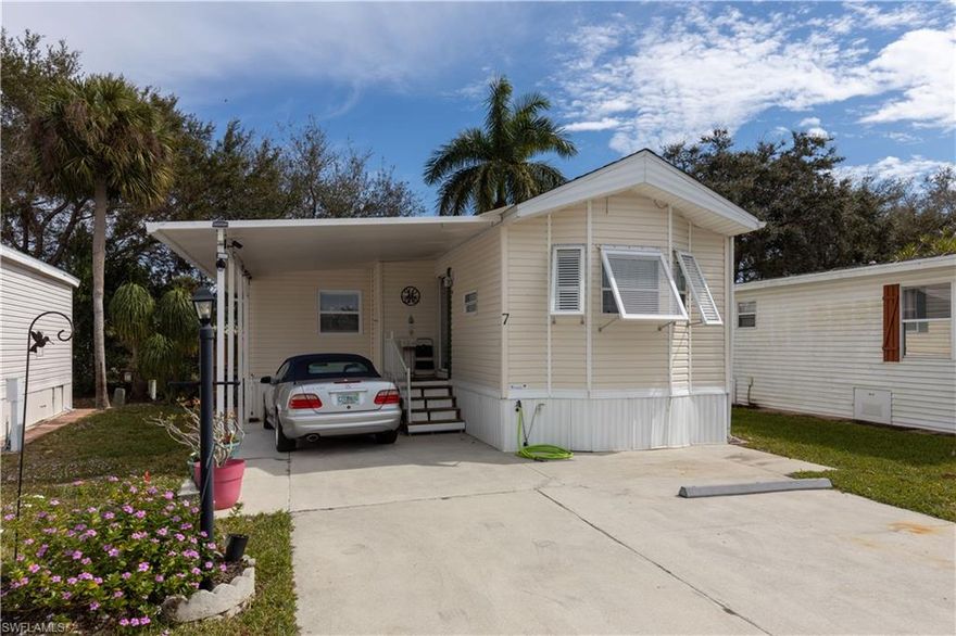 This cute little place offers something not found in this neighborhood very often.  It has a nice sized carport to protect your car from the beautiful Florida sunshine.  It has two nice sized bedrooms and one bathroom.   The second bedroom is currently being used as a sewing room.  The stackable washer and dryer are conveniently hidden in the second bedroom.  This cozy home is very comfortable with it's soft hues and sunlit windows making this a cheerful place to relax.  It also features a beautiful little deck where you can sit and enjoy the sunshine and the birds singing in the trees. The community of Imperial Wilderness is an active, gated, 55 plus community where you actually own the land.  You will never be bored here as there a many activities to keep you busy.