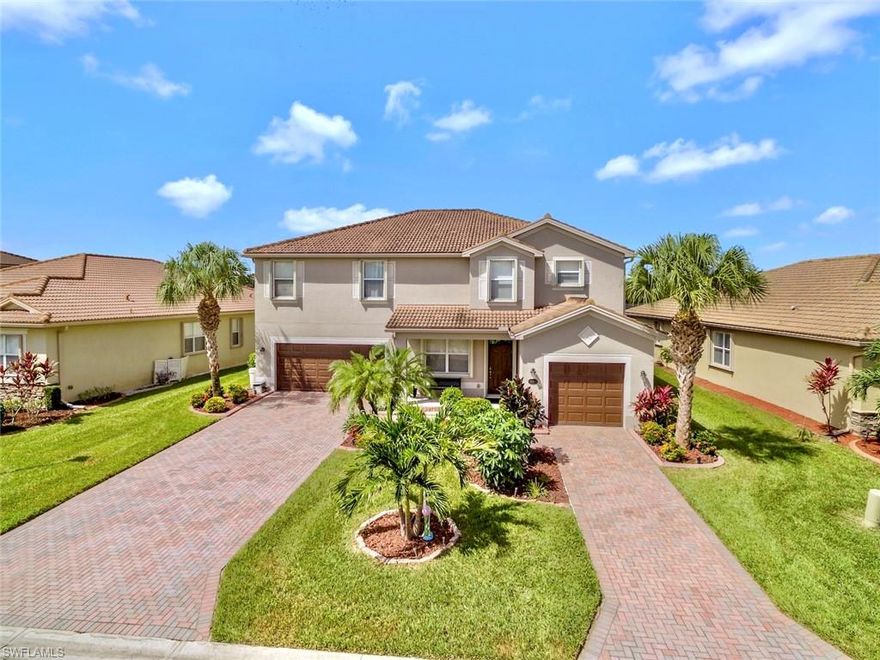 Customized Sorrento model featuring 5 bed plus Loft ~ 4.5 bath, Pool home with premium lake view! You won't find another one like this in this price range. This gorgeous kitchen has upgrades you will not see in others, upgraded appliances, pull-outs in the cabinets as well as in the spacious pantry and a large waterfall island you'll want to entertain at. Also features extensive luxury plank tile flooring, wood flooring, upgraded baths, whole house upgraded hurricane shutter package and more!! Second story loft that is perfect for a home office or school space for the kids. The spacious living areas lead to split bedrooms ensuring privacy, the Sorrento is perfect for a growing family and/or your guests. This premium lot offers plenty of privacy with added custom landscaping and a water view you'll be proud of. Bella Terra has a Resort-style Clubhouse and pool/spa, 24 hour fitness center, activities for all ages, shaded children's play area, tennis courts, pickle ball, bocce ball, sand volleyball, soccer/softball/hockey/football fields, tranquil butterfly garden, walking trails and much more....and the best part is the LOW HOA fees you get in beautiful Bella Terra!