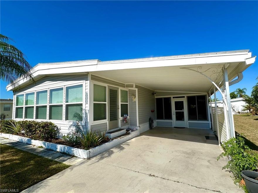 This two-bedroom, two-bath home in the Imperial Harbor 55+ community offers a thoughtfully designed layout with comfortable living spaces throughout and features a new rollover roof for added peace of mind.
The master bedroom includes light wood-grain flooring, a shiplap-style accent wall, a walk-in closet, and new windows, and is complemented by an en-suite bathroom accessed through frosted French doors. The master bathroom features a walk-in shower with glass doors, a rain showerhead, and a handheld attachment, accented with tile inside the shower. Additional features include a modern vanity with ample drawer storage, tile flooring, and extra cabinetry. A washer and dryer with overhead and side storage are conveniently incorporated into the space, creating an efficient laundry area. The guest bedroom offers light wood-grain flooring, a walk-in closet, and a new window. The guest bathroom includes a walk-in shower with raindrop-pattern sliding glass doors, a vanity with multiple drawers that coordinates with the mirrored medicine cabinet, tile flooring, and a Silestone vanity top. The kitchen features tile flooring and a convenient pass-through window to the Florida room, while the dining area includes built-in cabinetry for added storage. The living room is enhanced by new windows, and the Florida room, located just off the living area, features tile flooring, new surrounding windows, and a separate exterior entrance, providing flexible additional living space. The screened lanai includes epoxy flooring and sliding glass panels, creating an inviting space for outdoor enjoyment. A rear shed, accessed through the lanai, offers a separate entrance to the backyard along with a laundry tub and built-in shelving for additional storage. Club membership is included and provides access to amenities such as a heated pool, library, fitness center, billiards, bocce, shuffleboard, pickleball, and more.