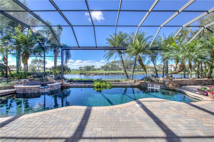 The Covington model you have been waiting for has the most spectacular views through the picture frame screen enclosure of the lake and golf course beyond. Enjoy all the wonderful amenities Shadow Wood has to offer in this beautiful home that offers numerous upgrades to both the interior and exterior features. The expansive screened-in lanai promotes an outdoor living experience with a built in wood burning fireplace and summer kitchen. Inside you will find crown molding, plantation shutters, and tray ceilings throughout. In the kitchen, you will notice stunning granite counter-tops, wooden cabinetry, walk-in pantry and an island complete with a built-in wine cooler and wine rack. The master suite offers a spacious environment with tray ceilings, plantation shutters, and a private entrance to the lanai. Located close to all the great shopping, dining, and entertaining attractions SWFL has to offer and access to a private beach club, golf course, tennis court, and much more amenities within Shadow Wood and The Brooks. Don't let this opportunity slip away, schedule your showing today!