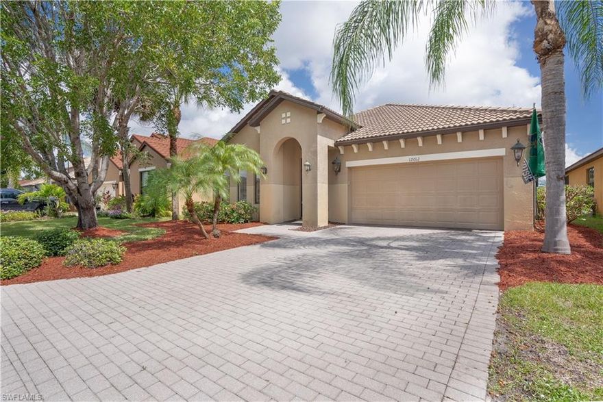 Welcome to your Fort Myers Dream Home! This Daniels Preserve home located in Gateway is ready for you to call home! Large 3 bedroom, 2 bath home with a heated pool and hot tub! This gated community offers all of the amenities of Gateway. The Daniel's Preserve playground is located at the back of the development. It consists of slides, swings, a rock wall and a jungle gym. The area is fenced for safety. Benches, picnic tables, and a grill are located next to the playground. The Gateway Neighborhood Park is open during daylight hours and offers a basketball court, sand volleyball court, and a playground. Did I mention there is a dog park with separate areas for your big and tiny pups. HOA fees on the low averaging $142 per month. Don't let this one pass you by!