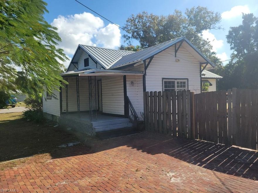 Investor/Rehab Special in East Fort Myers. 4BR/2BA home with homestead or rental possibilities located just off Palm Beach Blvd, and close to shopping, dining and entertainment venues! Much of the house has been rehabbed, new deck/porch and fence repairs! Large back yard with separate building. Don't delay-SCHEDULE a SHOWING TODAY!