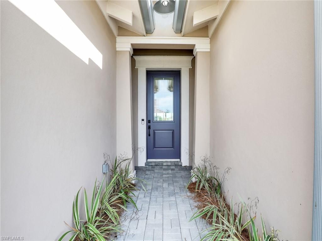 Photo of 8850 Calypso CT, NAPLES, FL 34112 (MLS # 226011240)
