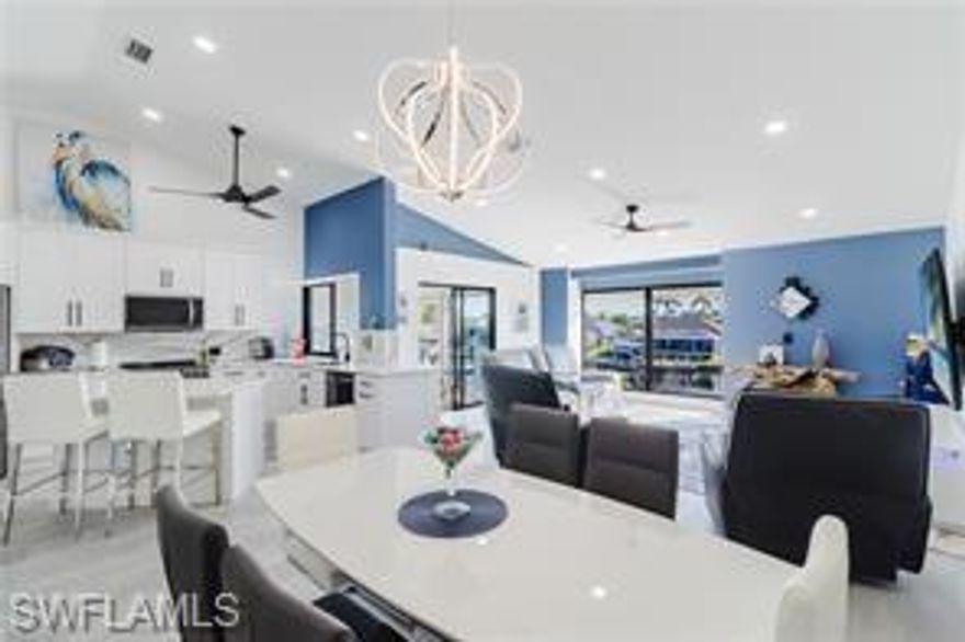 Welcome to this stunningly updated 2-bedroom, 2-bath condo in the sought-after Capstan Condo community in Cape Coral! This waterfront gem offers a modern, open-concept layout with gorgeous finishes, abundant natural light, and breathtaking canal views. The spacious kitchen features granite countertops perfect for cooking and entertaining. Both bedrooms provide ample space and comfort, with the primary suite boasting a walk-in closet and en-suite bath. Step outside to enjoy serene water views from your private screened lanai, ideal for relaxing or entertaining. Boating enthusiasts will love the included boat dock, offering direct access to Cape Coral’s scenic waterways. Residents of Capstan Condo enjoy resort-style amenities, including a heated pool, clubhouse, and more. Located just minutes from shopping, dining, and beautiful Gulf beaches, this condo is a must-see!