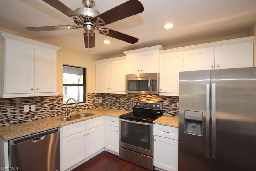 THIS IS IT!! This home is completely remodeled, with high-end finishes throughout. Located on a huge, private lot, this 2 bed 2 bath home is beyond gorgeous. Living areas have engineered bamboo floors, bedrooms have brand new carpeting with thick padding. The kitchen is straight out of a magazine, with modern white shaker cabinets, gleaming granite counters, and mosaic backsplash. There's also a moveable butcher block island and brand new stainless appliances. Both bathrooms have been tastefully remodeled as well. The roof was replaced in 2004, and the yard... This lot is HUGE, and has a fantastic tree in back. There is also a large shed for storage. AC was replaced 5 months ago, brand new sump pump, and water conditioning system was replaced less than 3 years ago. This is a move-in ready, single family home for $150,000...these deals are going away. San Carlos Park is so centrally located, with tons of shopping, dining, schools, places of worship, and just a short drive to the beach. Call today for your private showing!