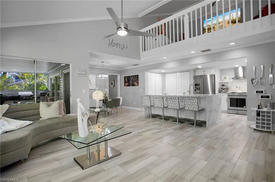 RENOVATED 3-bedroom/3-bath villa with two master suites. One master upstairs and one on the ground floor. 
The exterior of the units were recently updated as well, new siding and new Metal roof. No assessments. This well-maintained home is in a prime location in Central Naples. Located only minutes to shopping and dining, multiple golf courses, downtown Naples' 5th Avenue and the Gulf of Mexico's white sandy beaches. First floor features include open concept design, impressive stainless steel kitchen, gathering room, master suite with walk-in closet and second guest bedroom and bath. Second floor includes another bedroom, full bath and loft/office. Private, spacious, screened lanai. Two convenient designated parking spaces, one covered and one open. Outdoor amenities include basketball and tennis courts, dog park, community room and pool.