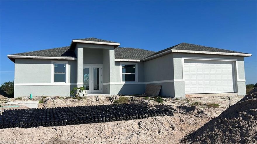 Under construction beautiful 4 BEDROOMS, ~THE 4TH BEDROOM IS A LARGE SIZE OFFICE ~ 2 BATHROOMS to be estimated completed by Nov 30th 2022. This home was designed modernly with a lot of features: Tray ceilings, lanai under truss, impact resistant windows and doors, all tile floors, floor to ceiling tiled master shower, 8’ interior doors, 9'4" ceiling high, Stainless steel appliances, Automatic garage door opener, ceiling fans in bedrooms great room and lanai, a nice size laundry room with a sink near the garage.       BUYER INCENTIVE: AT CLOSING, THE BUYERS WILL RECEIVE A 10 YEAR WARRANTY POLICY FOR THE NEW HOME FROM THE SELLER!!!