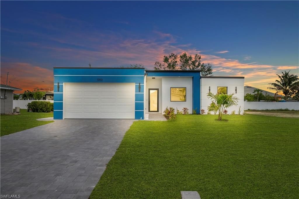 Photo of 1303 NE 6th AVE, CAPE CORAL, FL 33909 (MLS # 226007563)