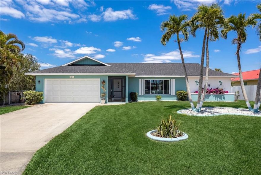 Nestled in the desirable Pelican neighborhoods of SW Cape, this charming 3 bed, 2 bath home offers an open floor plan with 1,400 sq ft under air. As you make your way through the front screened-in porch, you enter an open-concept, split bedroom layout designed for comfortable living. Key features include a new (2024) roof, brand-new impact-resistant windows and sliding glass pocket door (with lifetime warranty), fresh interior and exterior paint, updated door hardware throughout, a new garage door motor, and upgraded electrical outlets. The home also showcases vaulted ceilings and a fenced-in backyard with plenty of space for a custom pool. The light and bright kitchen features a central island overlooking the main living area and is outfitted with a full suite of newly installed stainless steel appliances, including a French door refrigerator with double drawer freezer, dishwasher, stove, and range hood. A new kitchen faucet and breakfast bar complete the space, making it the true heart of the home for everyday living and entertaining. Beyond the property, Pelican Sports Complex is just a few streets north, offering parks, baseball fields, and soccer fields, along with nearby Pelican Elementary and CCFD Station 9. Sidewalks along Pelican Blvd enhance neighborhood walkability and biking throughout the area. Enjoy the vibrant Marina Village at Tarpon Point Marina, featuring waterfront dining, boutique shopping, an art gallery, and The Westin Hotel. Also in close proximity, explore the revitalized downtown Cape Coral scene, including the popular Bimini Basin waterfront restaurant, perfect for dining, sunsets, and embracing the coastal lifestyle. Whether you're seeking a primary residence or an investment opportunity, this property checks all the boxes. Schedule your private showing today. Assessments paid in full.