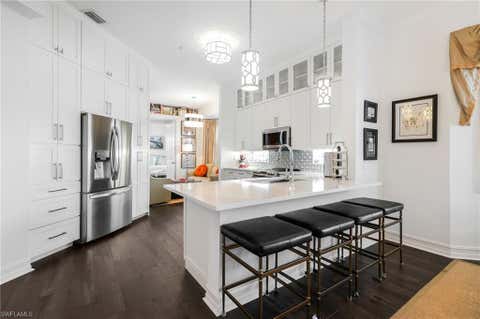 Photo of 700 Bentwater CIR #201, NAPLES, FL 34108 (MLS # 225004510)