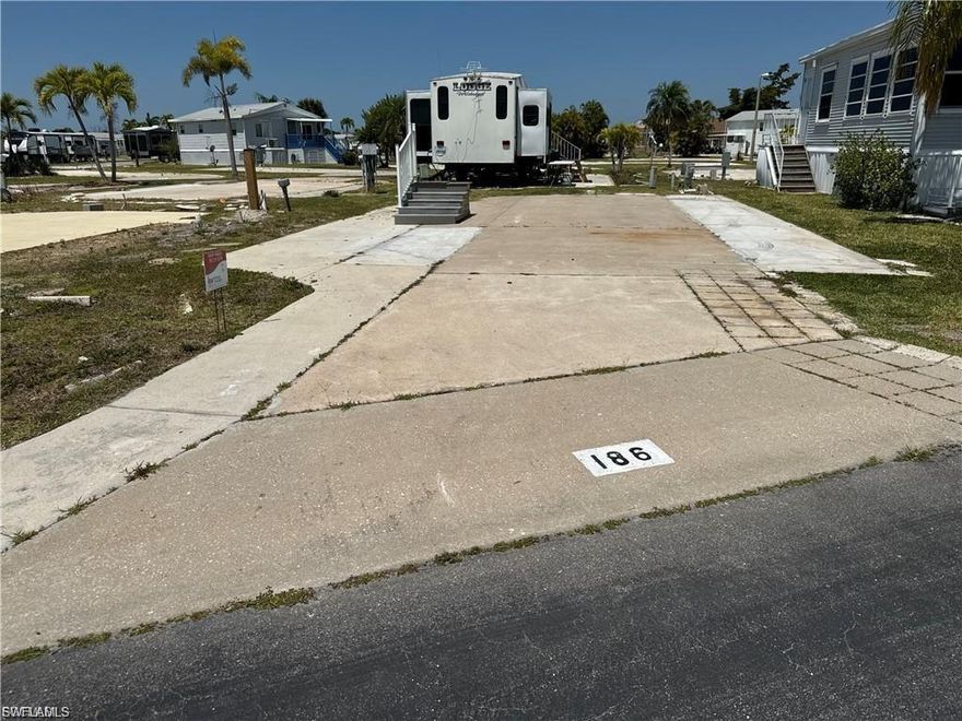 Welcome to Palmetto Palms where YOU own the land! This fantastic universal lot is very close to the clubhouse and the main pool. Electric, water,
and sewer connected and ready to go. This lot will accommodate a new manufactured home, camper, RV, fifth wheel, or ANSI park model. Palmetto
Palms is located just 1 mile from Bunche Beach County Park on the Gulf of Mexico and just 3 miles from Times Square Fort Myers Beach, and
Sanibel Island. Walk to shopping, bars, and restaurants, and enjoy some of the many amenities including tennis, pickleball, volleyball, horseshoes,
shuffleboard, two community pools, clubhouse, activities, and so much more. This lot is located on a two-way street in the non-pet section of a 55+
community. Welcome to endless Summer!!