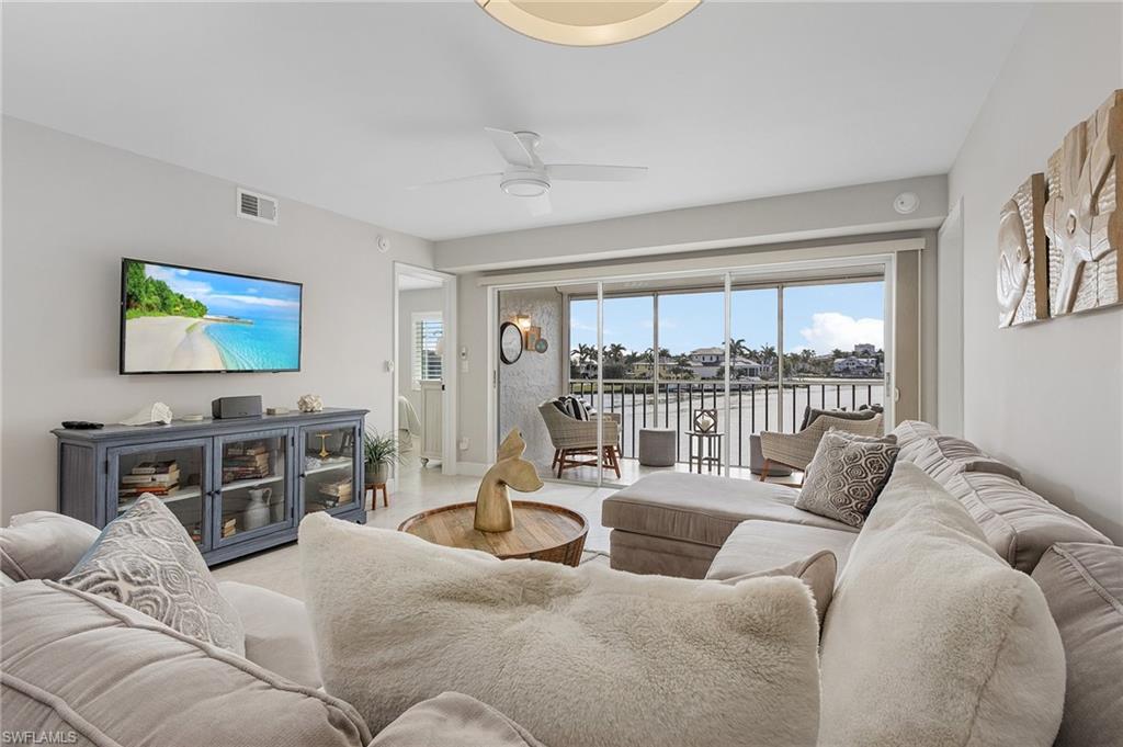 Photo of 10682 Gulf Shore DR #C-201, NAPLES, FL 34108 (MLS # 223087700)