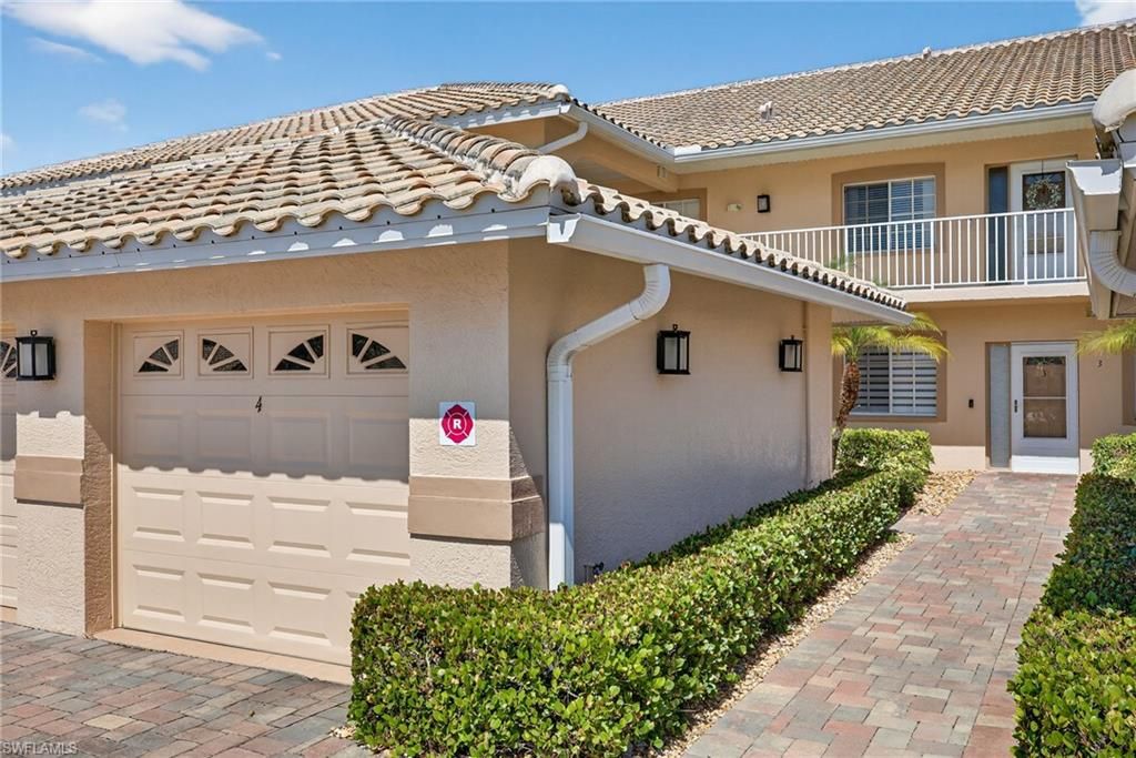 Photo of 9009 Michael CIR #4, NAPLES, FL 34113 (MLS # 226009540)