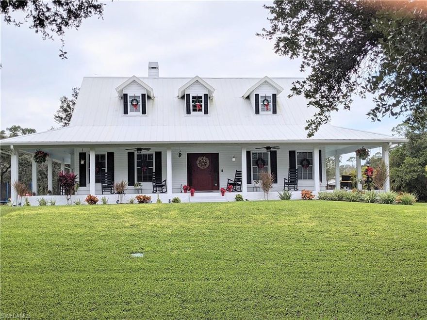 One-of-a-kind property offering privacy, versatility, and high-end functional upgrades, combining relaxed Florida living with dedicated space for work, wellness, recreation, and country-style freedom in a highly convenient location.

A charming wraparound porch sets the tone for peaceful mornings, sunset evenings, and effortless entertaining. Inside, the home features a comfortable, well-designed layout with very large bedrooms, generous living areas, abundant natural light, and a real wood-burning fireplace that adds warmth and character.

Interior finishes include shiplap accents, crown molding throughout, stainless steel appliances, and a gas stove, blending timeless charm with modern convenience.