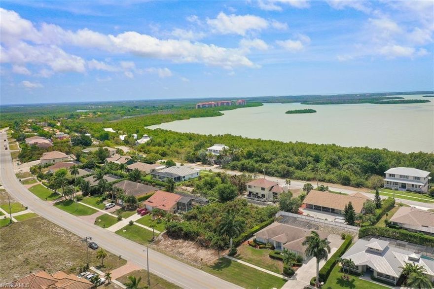 Now mostly cleared and a fantastic opportunity to build your Marco Island dream home on this elevated lot which over looks a small bay area.  Great location close to shopping, beaches, Goodland, and all of the fantastic things Marco Island has to offer.