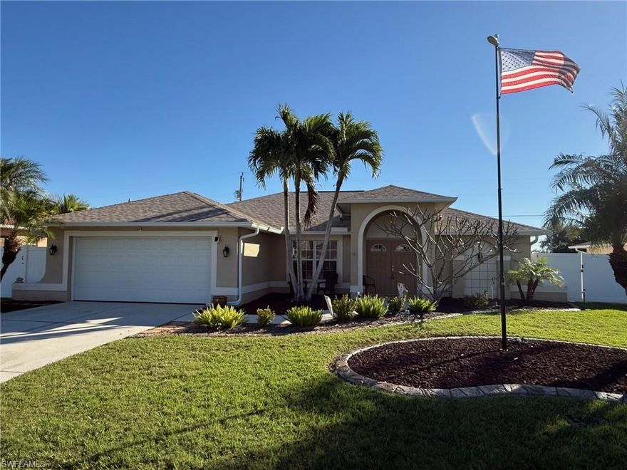This meticulously cared for 3 bedroom and 2 bathroom plus den property is centrally located in SE Cape Coral. The property is within close proximity to public schools, shopping and entertainment. When entering the property one has unobstructed views of the fenced backyard and screened in lanai. Lots of natural light and vaulted ceilings. To the right of the front door is the primary bedroom with sliding glass door out to the covered lanai as well as an en-suite bathroom with dual sinks, shower and a separate toilet. To the left of the front door is the den, which can be closed off for privacy by closing the 2 glass doors. The living room, kitchen and dining room comprise the center of the home, while the 2 guest bedrooms share a guest bathroom that is also accessible from the lanai are located on the left side of the home. The 2 car garage features epoxy flooring and ample space for 2 vehicles. The roof was replaced in 2022 (after Hurricane Ian). The backyard offers plenty of green space to enjoy to play games, let your pets run wild or to add a swimming pool. The yard is fenced and therefore offers plenty of privacy from the surrounding neighbors. This property has been very well cared for and truly reflects of what pride in ownership looks like.