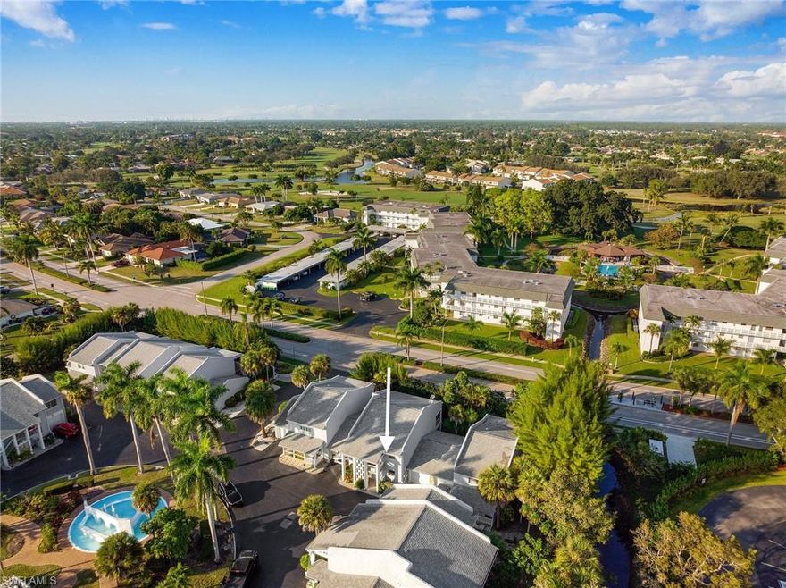 High & Best Offer by tomorrow Friday 5pm! The one that you have been waiting for in Four Fountains is finally available. The bright entryway to this fantastic condo greets you from the Florida sun.   The kitchen, to your right, is updated with all modern conveniences with plenty of counter space, French door refrigeration, vaulted ceiling, and window above sink that adds even more natural light. Entertaining is enhanced as those in the kitchen and living space can join in on conversation and fun.  The dining and living space is plentiful with beautiful views of the enclosed lanai and private outdoor space that make you feel sequestered.  Retire in the evening in the large primary bedroom with a book.  Your guests will feel at home with the additional bedroom as well.  Laminate flooring throughout the home adds another layer to the crisp clean lines of this home.  The attached one car garage from the kitchen, washer and dryer add additional convenience as well.  Enjoy all the comforts of Lely Resort with tennis courts, community pool, and club house.  With its location to Saint Andrews Boulevard and fast access to US 41, Downtown Naples, beaches, restaurants and much more