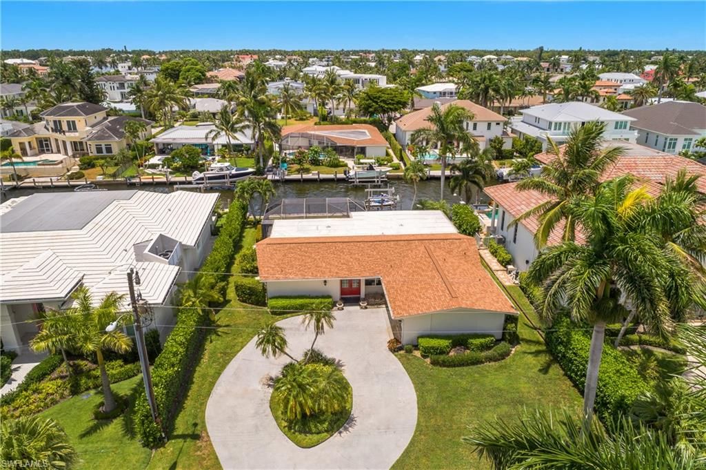 Photo of 2340 Snook DR, NAPLES, FL 34102 (MLS # 225065871)