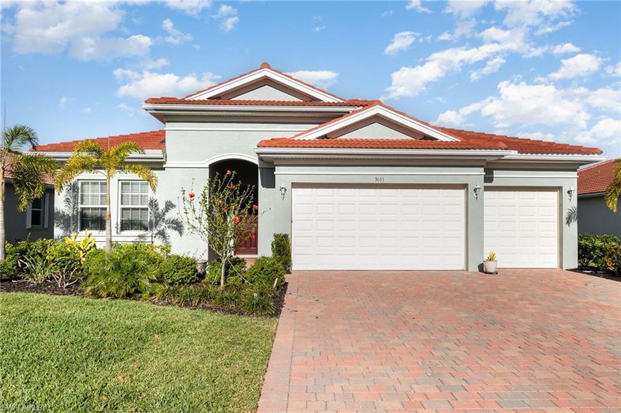 A true gem - don't miss this elegant 3-bedroom plus den POOL/SPA home with 3 full and 2 half baths.  Enjoy 2,584 sq ft of thoughtfully designed living space with sweeping views of the 4th fairway and a show-stopping outdoor oasis. The open-concept layout is ideal for everyday living and entertaining, centered around a gourmet kitchen featuring a large island, 40" white upper cabinets, light gray lower cabinets, soft-close cabinetry, deep gray backsplash, custom pantry built-ins, and pull-out drawers. Light-filled living and dining areas showcase tray ceilings, upgraded lighting, and an aquarium window overlooking the custom pool and golf course. The primary suite is a private retreat with two walk-in closets, dual vanities, and a spa-style walk-in shower, while a second ensuite bedroom with walk-in closet offers excellent guest privacy and the den with double doors is perfect for a home office or flex space. Triple sliders open to a resort-style lanai with pool and spa, sun shelf, outdoor half bath, and views of the 4th fairway. Additional highlights include a three-car garage, large laundry room with sink and cabinetry, full home gutters, landscape curbing, plantation shutters, a coastal-inspired color palette, and a quiet street with a 60' lot, deep driveways, and friendly neighbors. Magnolia Landing residents enjoy lawn care included in the HOA along with pickleball, bocce, shuffleboard, lap and resort-style pools, an optional championship golf course, and an active social calendar