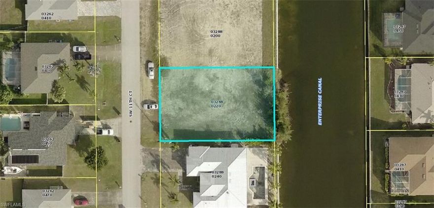 Beautiful Cape Coral Waterfront Homesite with City water, sewer and irrigation.  Buyer to assume balance of
utility assessments.