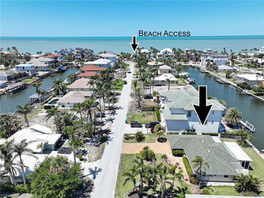 This property offers the ultimate Naples lifestyle in one of the most desirable locations.  Large waterfront lot will accommodate a 3 story pool home, beautiful Vanderbilt beach is across the street via a convenient beach access, long water views east to west down the wide canal, and premier boating right out your back door to the Gulf of Mexico. House is being sold as-is and Seller will not be making any repairs to the property.  Boat dock and seawall in place but being conveyed in their as-is condition.