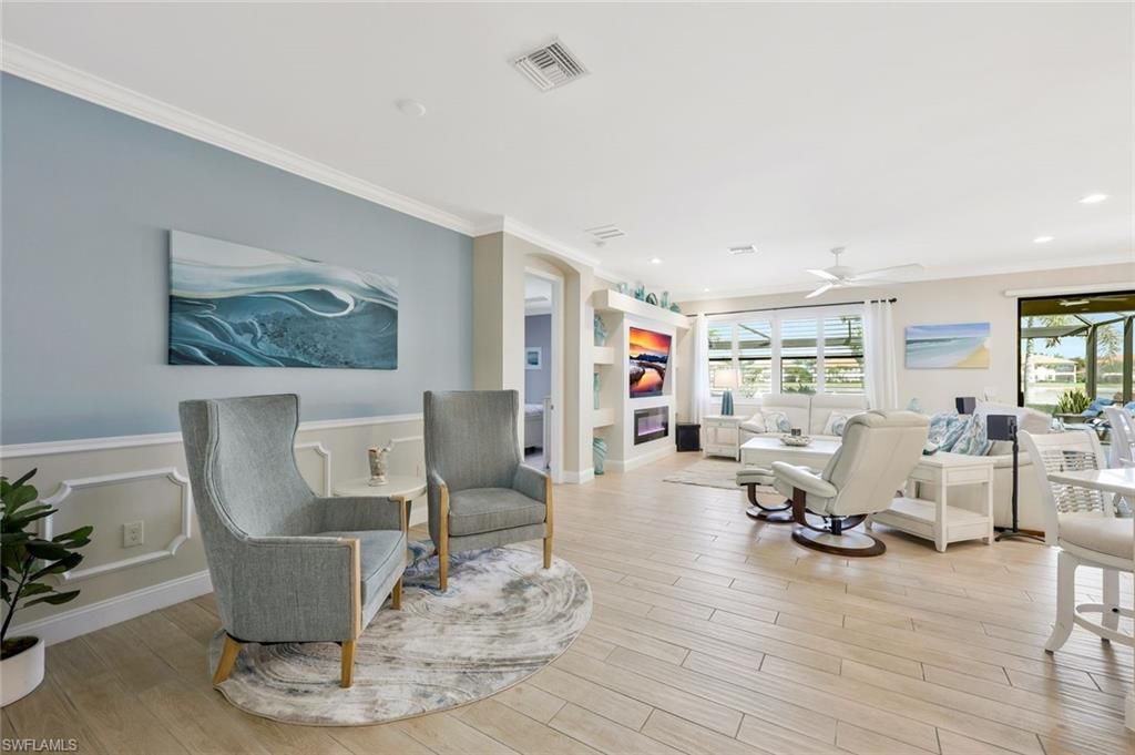 Photo of 26159 Grand Prix DR, BONITA SPRINGS, FL 34135 (MLS # 226013738)