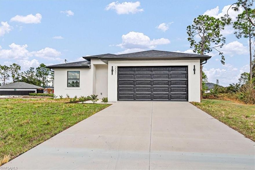 Location, location! Be the first to live in this brand-new 3-bedroom, 2.5-bathroom home on a spacious corner lot! Currently under construction, this property is perfect for a buyer with vision. Designed for modern living, it features high ceilings, an open-concept layout, and stylish finishes throughout. Each of the three bedrooms includes a walk-in closet, offering plenty of storage and comfort. The kitchen will showcase stainless steel appliances, sleek cabinetry, and a modern backsplash. Enjoy a large primary suite, 2.5 upgraded bathrooms, and a 2-car garage for convenience. Sliding glass doors open to a generous backyard, ideal for entertaining or relaxing. Located near SR-82, excellent schools, shopping, and dining, with easy access to Fort Myers and major highways. Don’t miss this opportunity in one of Lehigh Acres’ fastest-growing areas!  Don’t miss this opportunity.