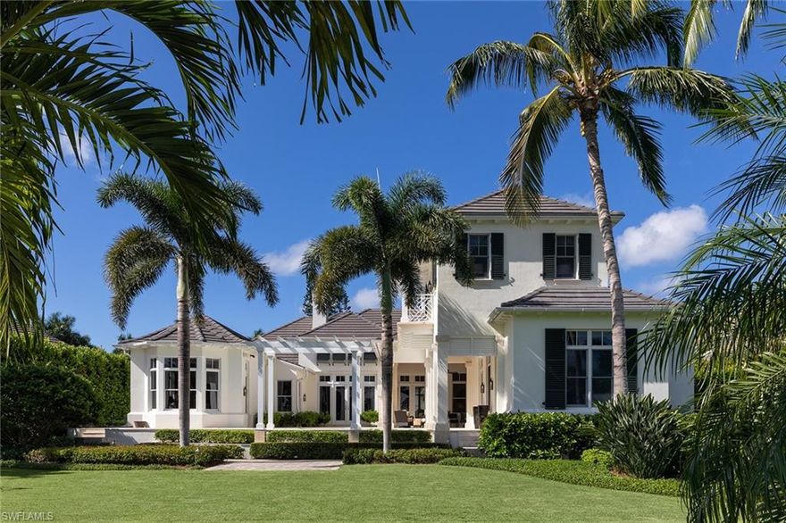 This stunning Port Royal home overlooks the lovely Runaway Bay. Designed by Stofft Cooney Architects, this home exudes classic design and casual charm. The spacious floor plan and generously sized rooms make this home an ideal family retreat for relaxation or gracious entertaining. The outdoor area has an inviting pool, spa and large grassed rear yard. Lush and mature landscaping surround this home creating a very quiet and peaceful ambiance. For the boating enthusiasts, this home is complete with a custom dock with two separate boat lifts. 5,595 square feet of Living Area, 4 en-suite bedrooms plus den, 4 full baths and 2 half baths, 4 car garage.