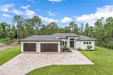 Photo of 2840 Golden Gate BLVD W, NAPLES, FL 34120 (MLS # 226021680)