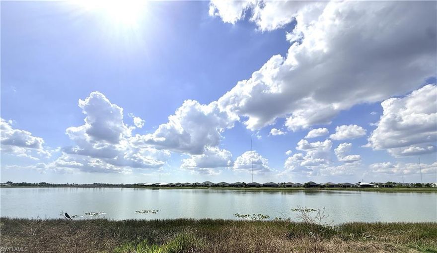 Don’t miss your chance to own the popular Myers floor plan in Waterview Landing! This exceptional homesite features stunning water views and desirable western exposure on Lake Babcock, creating the perfect setting for unforgettable sunsets year-round. The thoughtfully designed open-concept layout blends the living, dining, and kitchen areas into one bright, airy space filled with natural light and picturesque lake views. Beautiful faux beams highlight the great room living area. The kitchen is beautifully appointed with quartz countertops, quality wood cabinetry, stainless steel appliances, and a natural gas cooktop—ideal for everyday living and elevated cooking experiences. The primary suite offers a peaceful escape with expansive water views and a spa-like bathroom featuring dual vanities, quartz surfaces, and elegant finishes. A Jack-and-Jill bedroom and bath arrangement adds flexibility and privacy for guests or family. Built to current Florida standards, the home includes impact-resistant windows and doors for added security, efficiency, and comfort, along with a builder warranty for confidence in your investment. A limited-time rate buydown opportunity is also available. Situated in Babcock Ranch, the nation’s first solar-powered town, residents enjoy access to resort-style amenities, miles of scenic trails, and a dynamic community focused on sustainability and outdoor living. Please see MLS supplements for design selections and floor plan details. Lot 7.