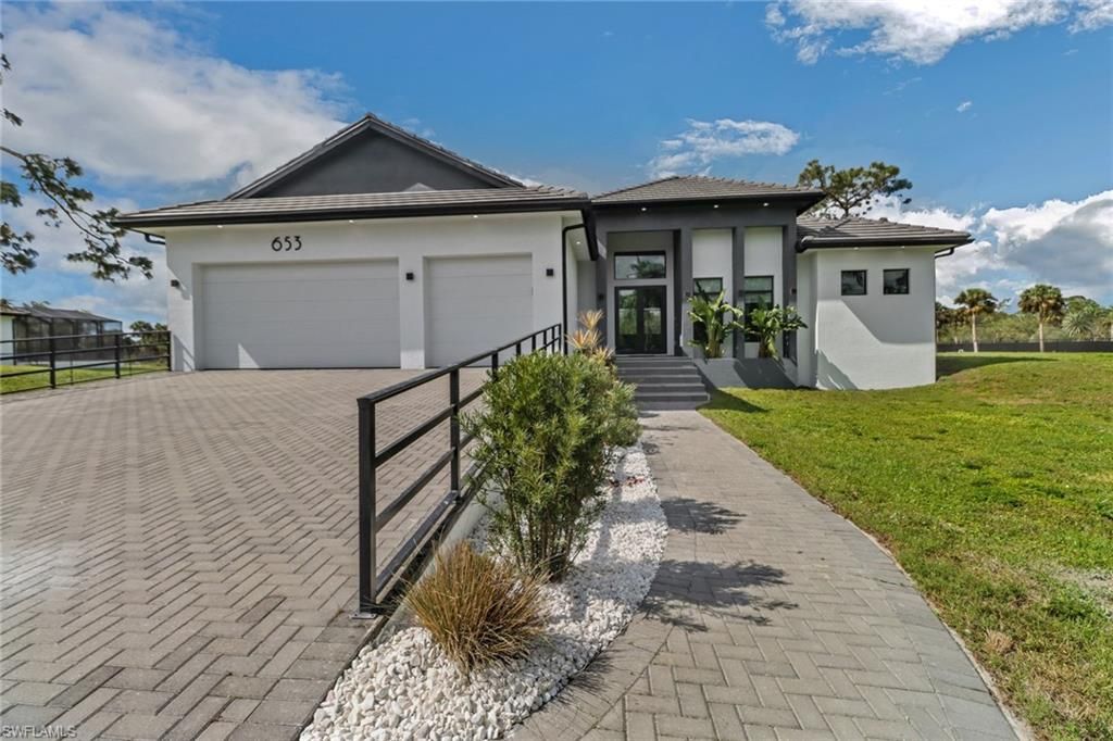 Photo of 653 23rd ST SW, NAPLES, FL 34117 (MLS # 226004540)