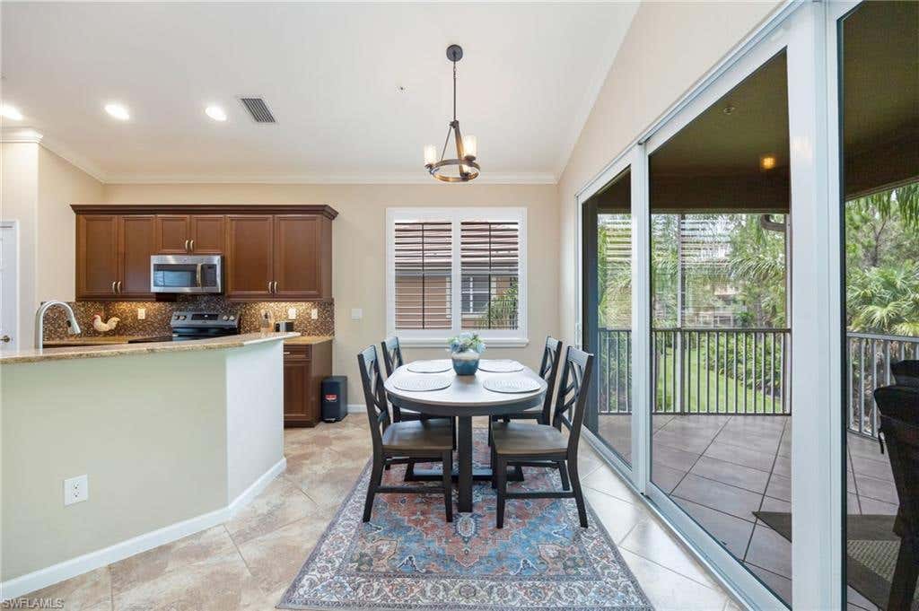 Photo of 6657 Alden Woods CIR #201, NAPLES, FL 34113 (MLS # 226022772)