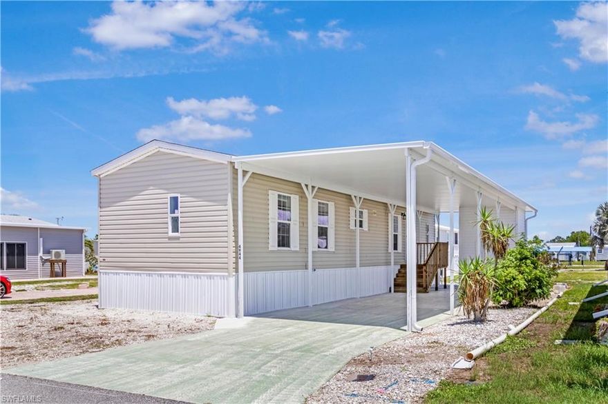 We are proud to bring you your slice of tropical paradise in Pine Island Cove, one of St. James City’s most desirable 55+ communities! This brand-new 2 bedroom, 2 bathroom manufactured home has just been installed and is elevated to meet current flood zone elevation requirements, providing peace of mind and potential insurance savings. With an open-concept floor plan, a split-bedroom layout, and a dedicated laundry room, this home is both functional and filled with natural light.

Outside, enjoy the convenience of a new covered carport and matching storage shed—ideal for your tools, beach gear, or golf cart. Best of all, the home is located just three homes away from the community center and an easy walk to the heated community pool and other amenities.

The interior and exterior comes as a blank slate—fresh, neutral, and ready for your personal touches to make it truly your own. Add your preferred finishes, furnishings, landscaping, and décor to create your perfect Florida retreat.

Pine Island Cove offers direct Gulf access via a private community boat ramp, along with RV/boat storage, an active clubhouse, and a full calendar of social events. The HOA is low and the island lifestyle is unmatched.

Pine Island is known for its laid-back atmosphere, tropical surroundings, excellent fishing, art galleries, and waterfront dining—a true escape from the mainland grind.

Don’t miss this opportunity to own a brand-new, elevated home in a welcoming waterfront community. Schedule your private showing today and make this island gem your own!
