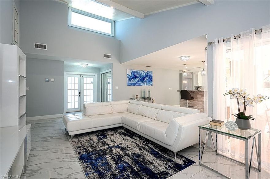 Fantastic home in the quiet north-eastern part of the Golden Gate City. 3200 square feet of living space on an oversized 0.31 acre corner lot. 6 bedrooms and 4 bathrooms! House is organized in 3 living zones so that each one has its own kitchen or wet bar. In addition to the main entrance, each zone has its own entrance too, giving you the possibility to use the house as one, or split it in three. Fully renovated with new roof, new plumbing, new insulation, fantastic 24x48 porcelain tiles, frameless shower doors, enormous kitchen with designer granite wrapped countertops, built-in appliances, wine cooler and so much more! 2 new AC units. Patio for entertaining and enough space to park all your toys! All that with no HOA fees! Look at the photos and the video tour of the house to appreciate it. This is a unique opportunity that is definitely worth seeing!