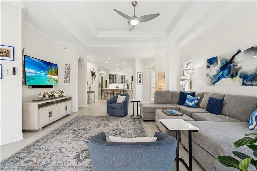 "Transitional Contemporary Living"...Take a look at this beautifully appointed home located in one of Grandezza Country Club's most sought - after neighborhoods, Saraceno. Blending transitional style with contemporary updates, this home offers a fully renovated modern open-concept design and a lush salt water pool and spa area that creates a truly tranquil setting. Inside this meticulously kept 3 bedroom, 2 bathroom home, you'll find thoughtful updates throughout. The redesigned kitchen features a large center island, all new appliances, quartz countertops, with modern cabinetry. New flooring flows seamlessly through the home, leading to an oversized primary suite with a remodeled shower, dual sinks and a soaking tub. With over 2000 sqft, this spacious layout is ideal for entertaining and includes a versatile flex room, perfect for an office or additional guest space. The screened salt water pool and spa area overlooks a peaceful preserve, offering a private outdoor retreat for relaxing or hosting. Additional upgrades include, new roof (2023), new HVAC system, salt-converted pool with new heater and pump, electric hurricane shutters, epoxy-finished 2-car garage flooring, and all new landscaping -making this an easy, move-in ready choice for the Buyer seeking style, comfort, and convenience. Grandezza Country Club offers 18 hole Championship Golf, tennis courts, fitness/wellness center, along with formal/causal dining and many social activities. Grandezza is minutes from SWFL International Airport, FGCU, I-75, shopping and restaurants.