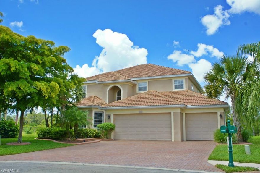 Stunning, like new home with nearly 3,000 square feet of Living Space, 5 Bedrooms, 3 Full Bathrooms, 3 CAR GARAGE, located at the end of a quiet cul-de-sac on a 1/3 acre w/brick paver lanai, a large heated pool and a peaceful private yard overlooking the preserve area. This gorgeous home features 18" tile floors on a diagonal throughout the living area, crown molding, plantation shutters, all baths are upgraded w/wood cabinets, nice tile work and Corian counters. The kitchen has granite counters, upgraded wood cabinets, island, stainless steel appliances, breakfast bar and nook. All appliances and A/C were new in 2010. Additional exterior upgrades include a brick paver driveway, decorative concrete curbing around the entire home, lush landscaping and an extra paver patio area off the lanai. Stoneybrook at Gateway is an outstanding gated community that has a large pool, clubhouse, fitness center, basketball courts, tennis courts, volleyball courts, playground & more. Low HOAS!!